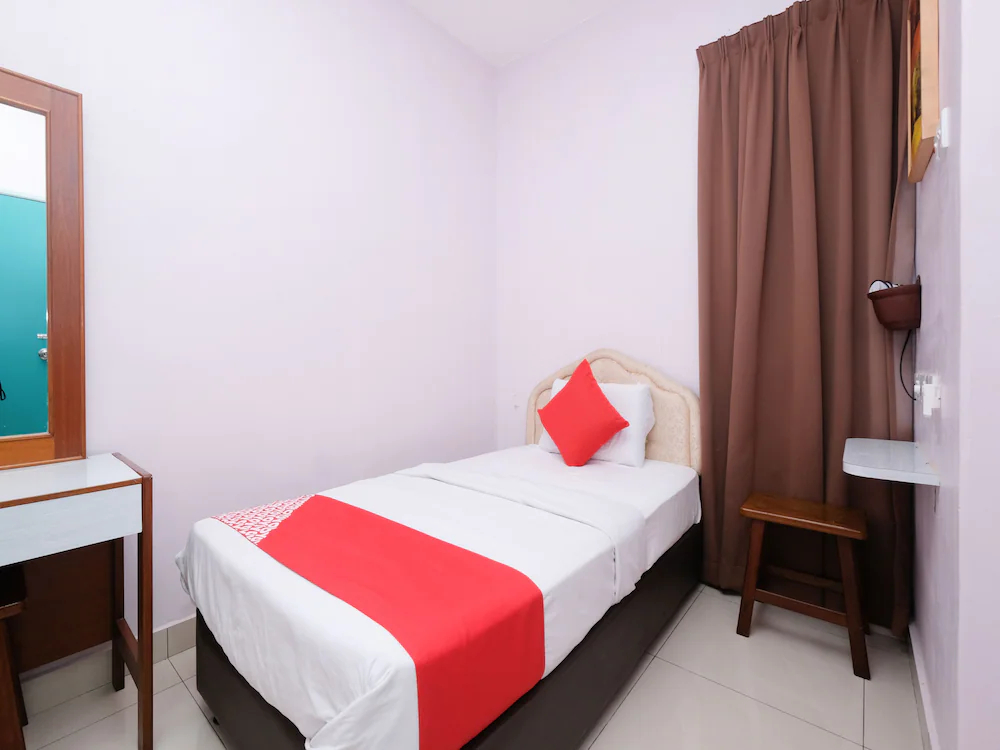 Sun Triang Hotel by OYO Rooms