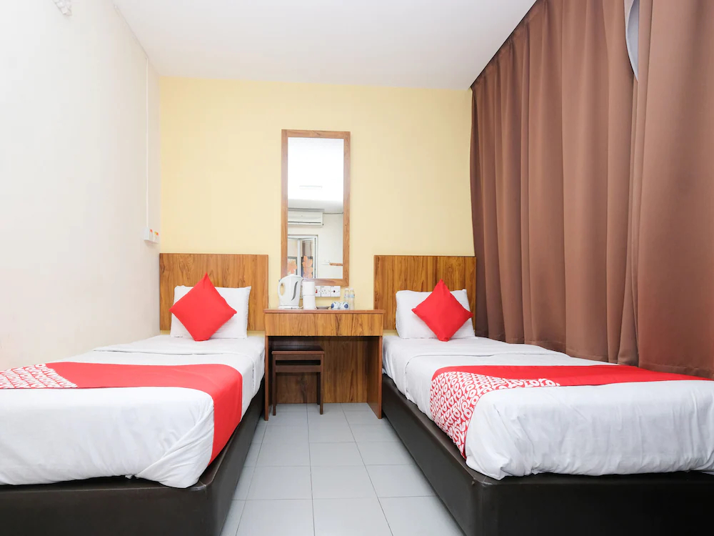 Sun Triang Hotel by OYO Rooms