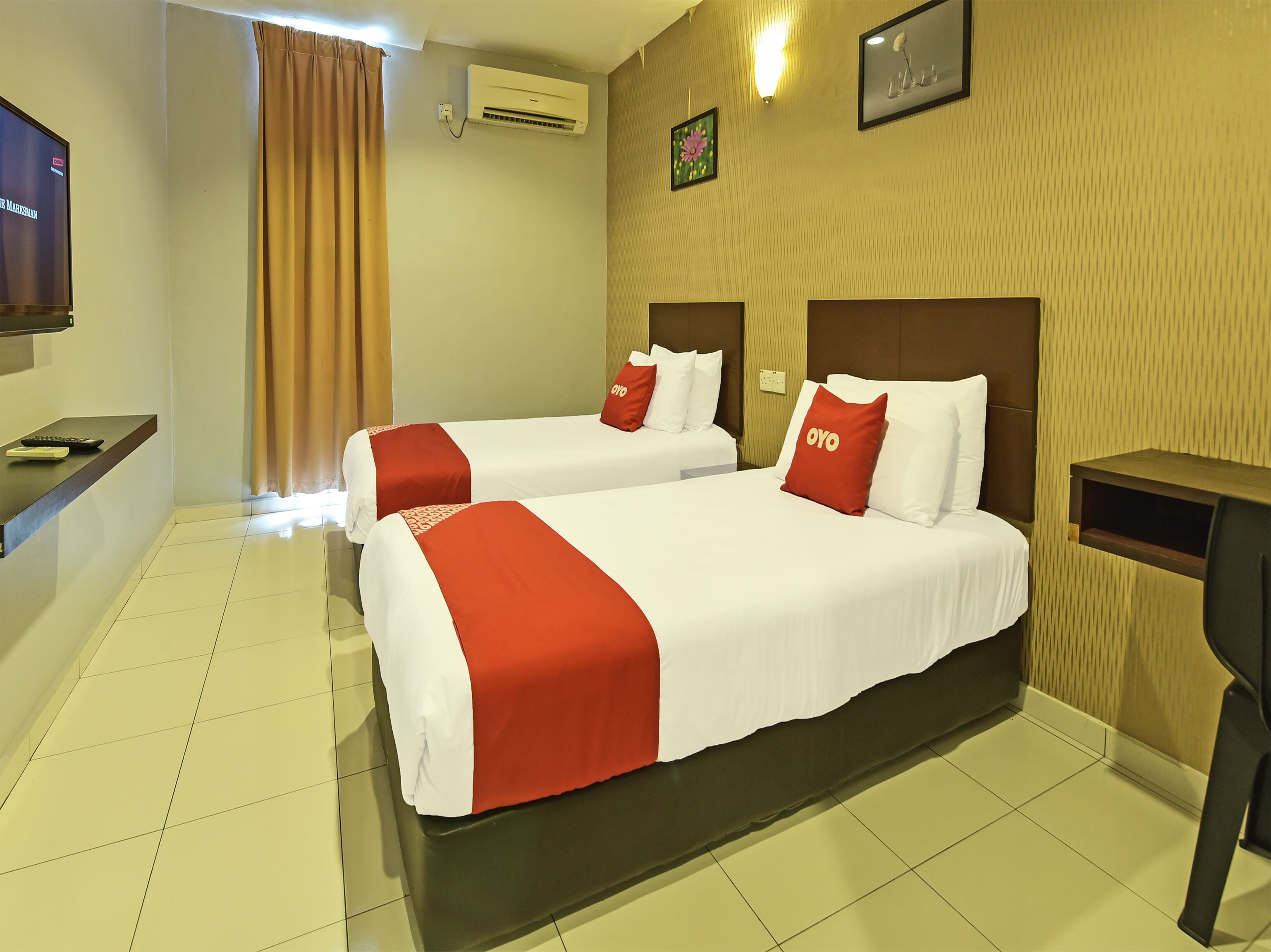 M Three Hotel by OYO