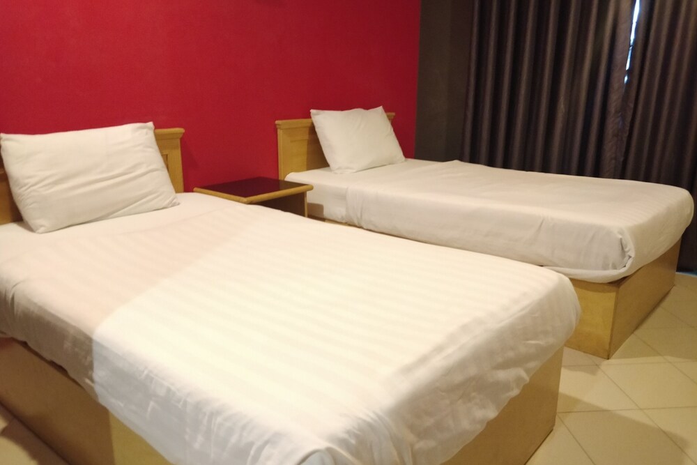 V Hotel by OYO