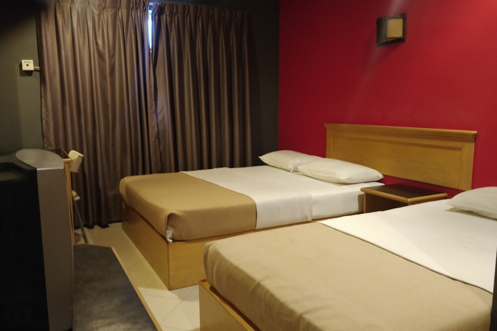 V Hotel by OYO