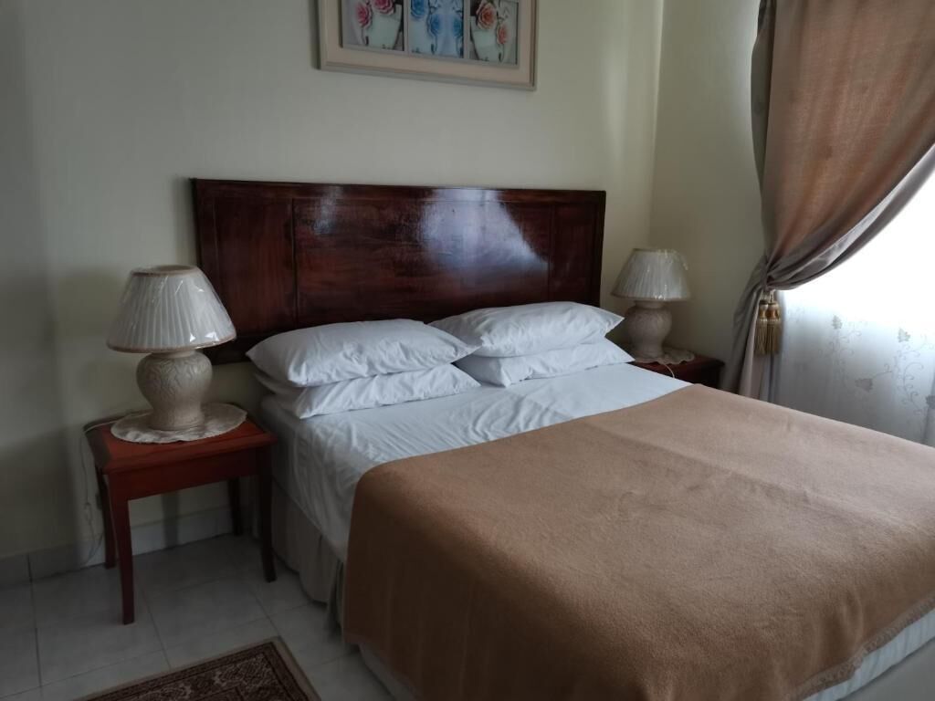 Aini's Guest House In Vista Amani Condo