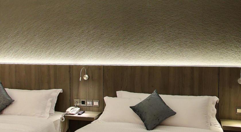 Flora by Crossroads Hotel