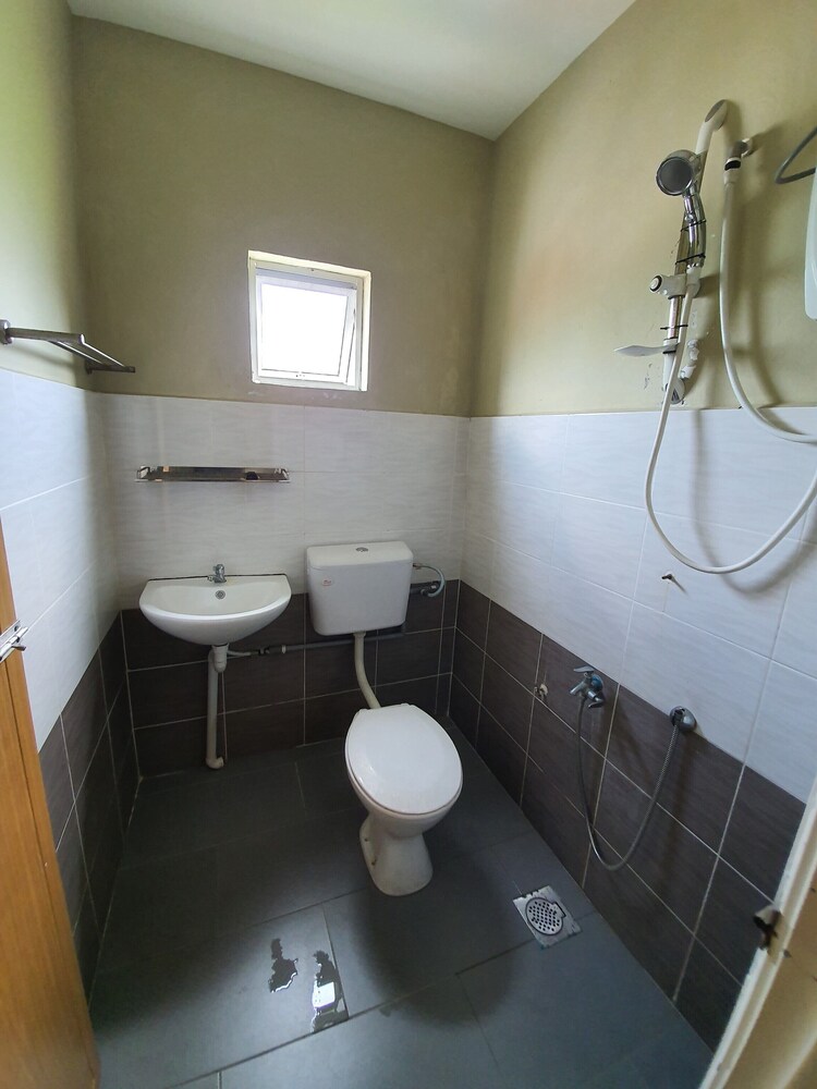 Sweet Home Hotel by OYO Rooms