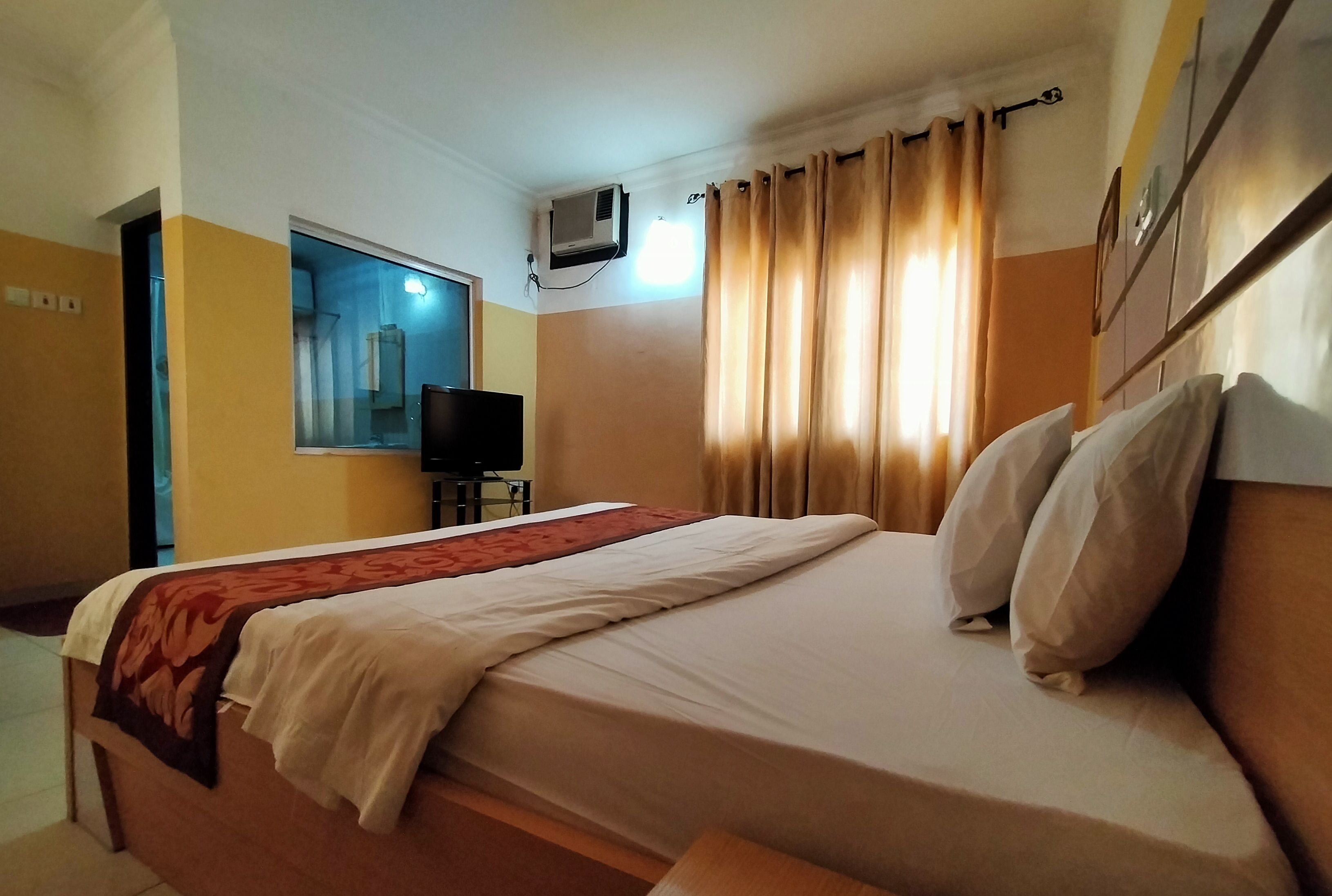 Joy House Hotel & Suites