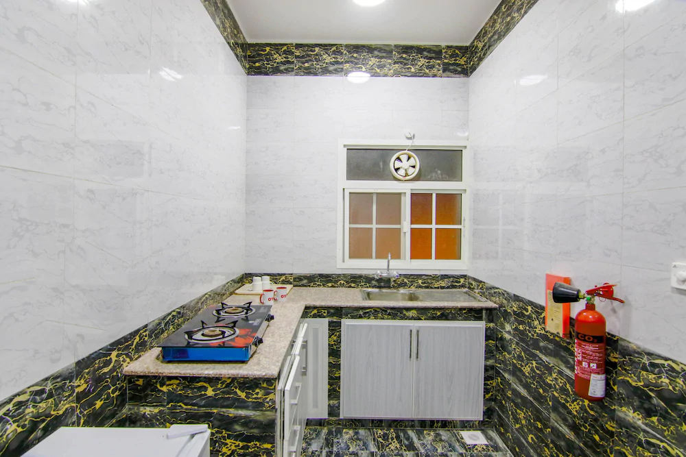 Al Gazzaz Furnished Apartment by OYO Rooms