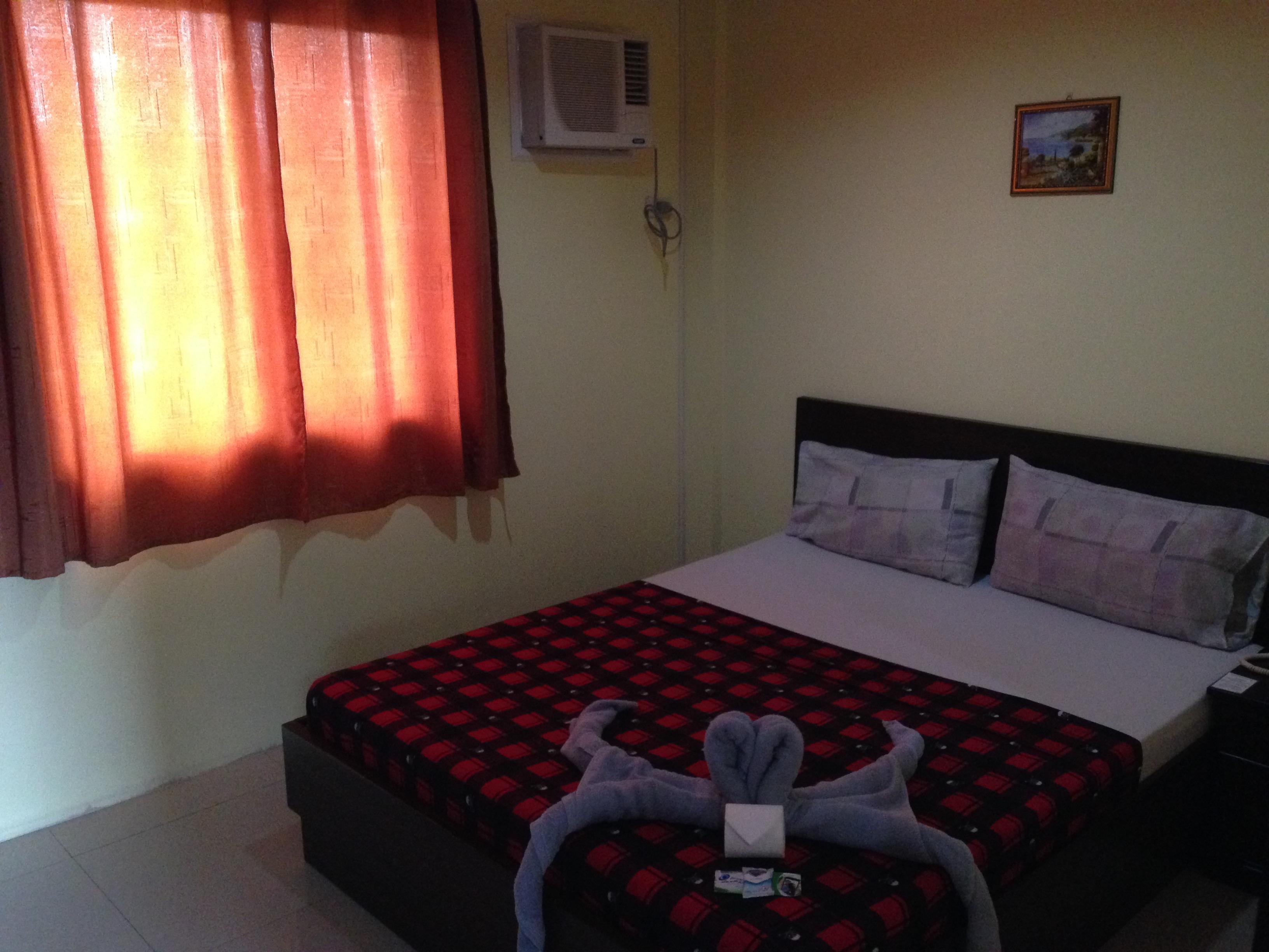 Poleng Suites Hotel