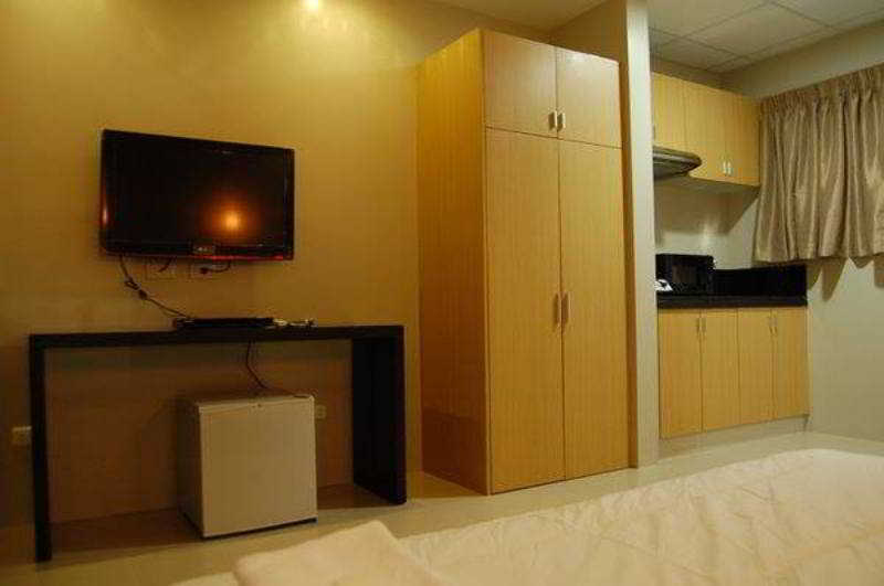Rumi Apartelle Hotel