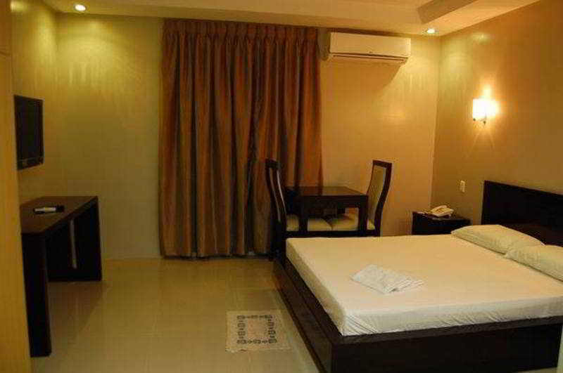 Rumi Apartelle Hotel