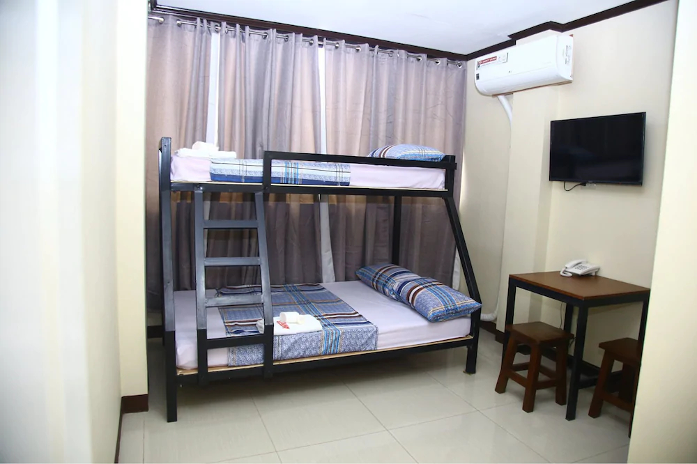 Andrew's Apartelle by OYO Rooms