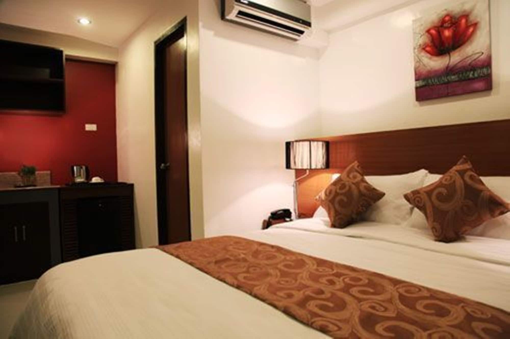 Capital O 820 Guijo Suites Makati