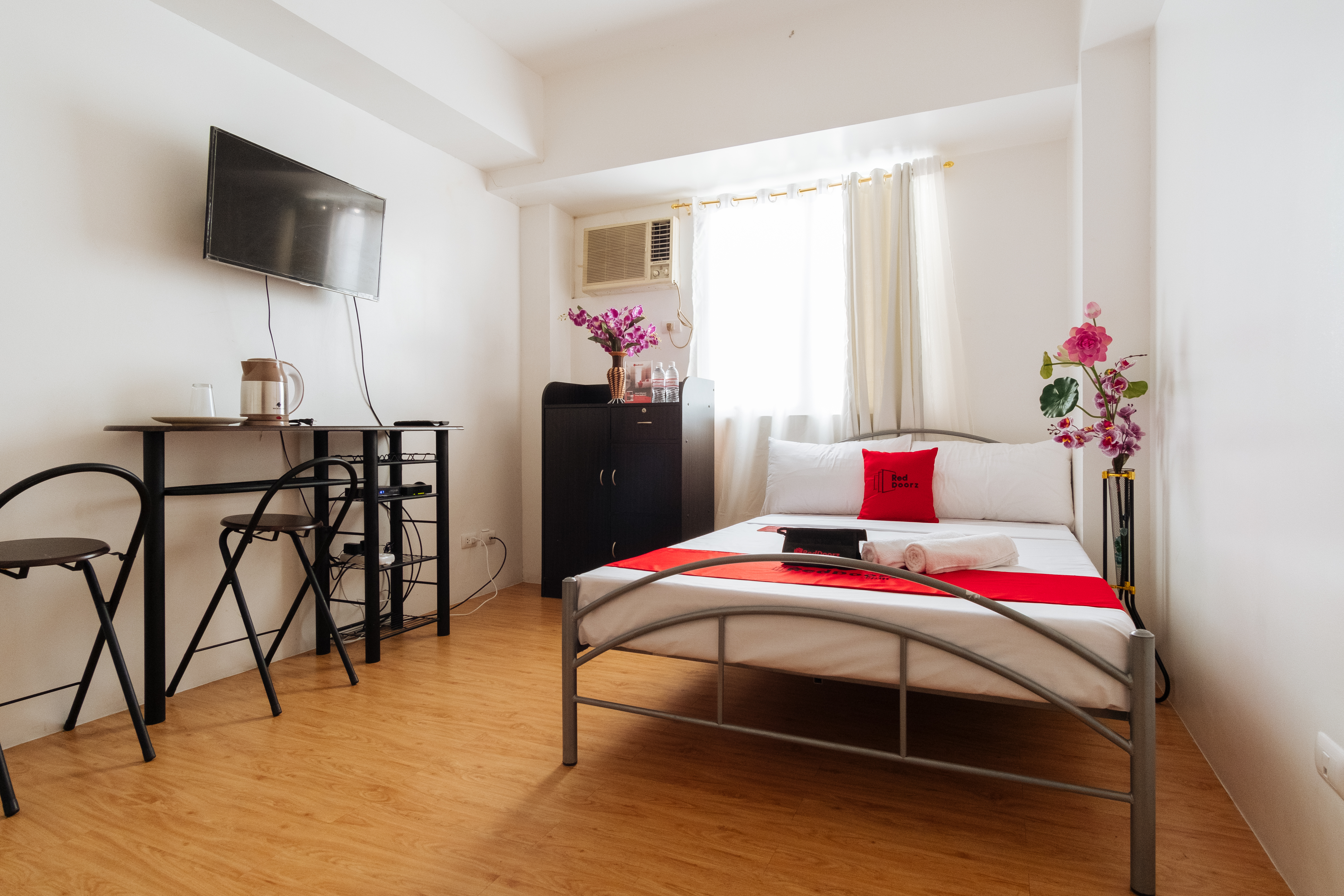RedDoorz Premium @ Amaia Skies Avenida