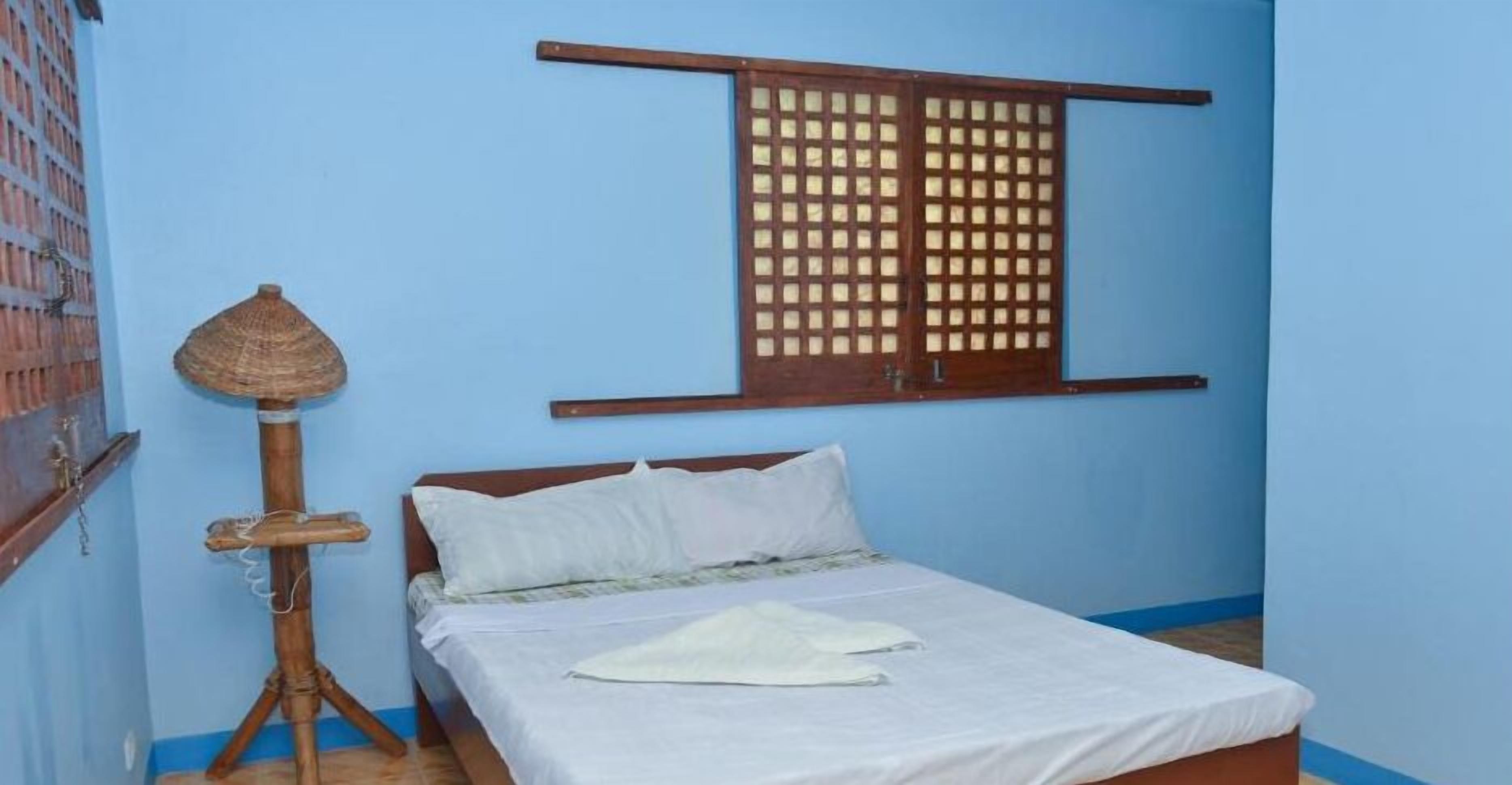 Isla Divina Inn by RedDoorz