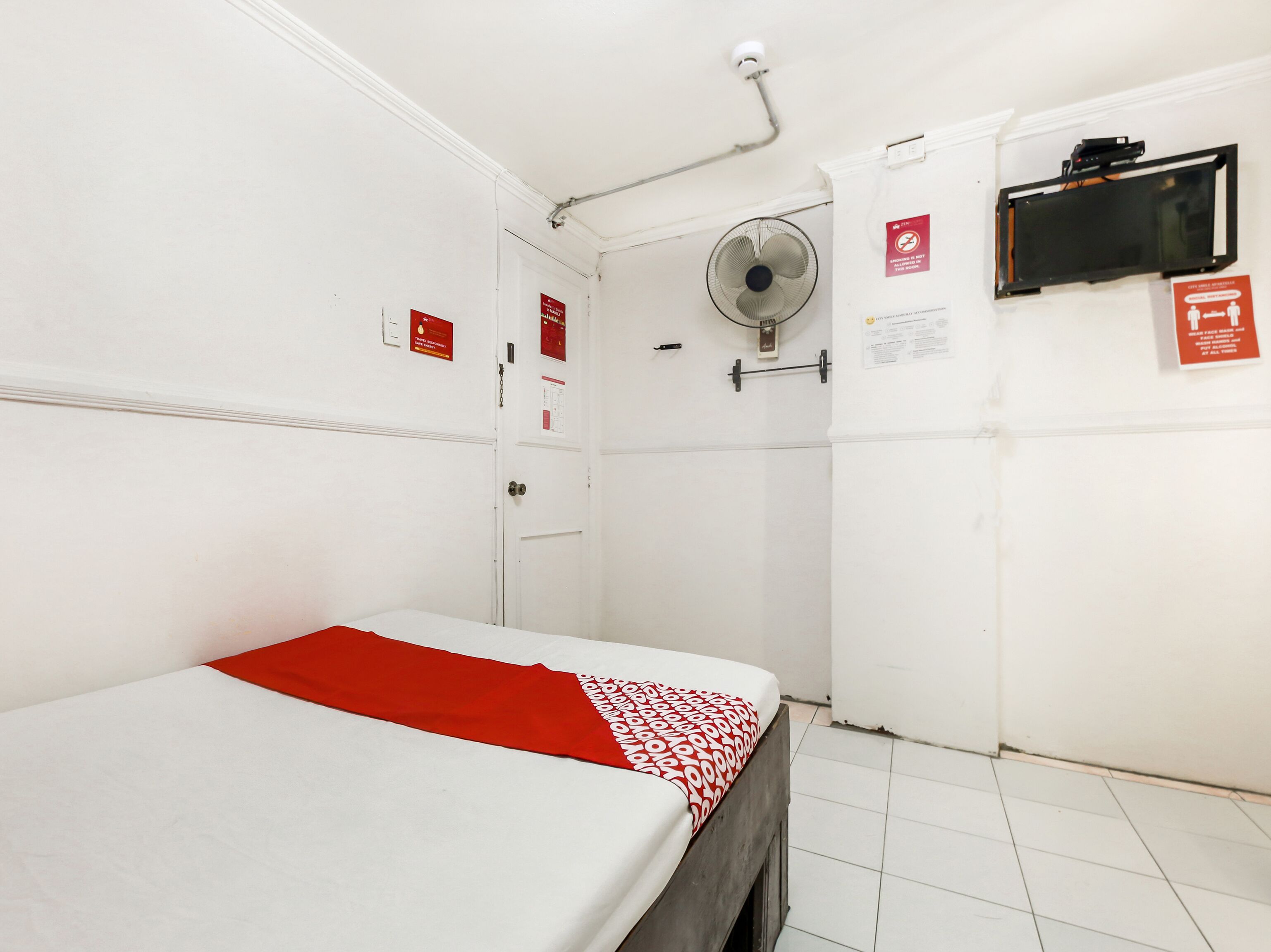 City Smiles Apartelle by OYO Rooms