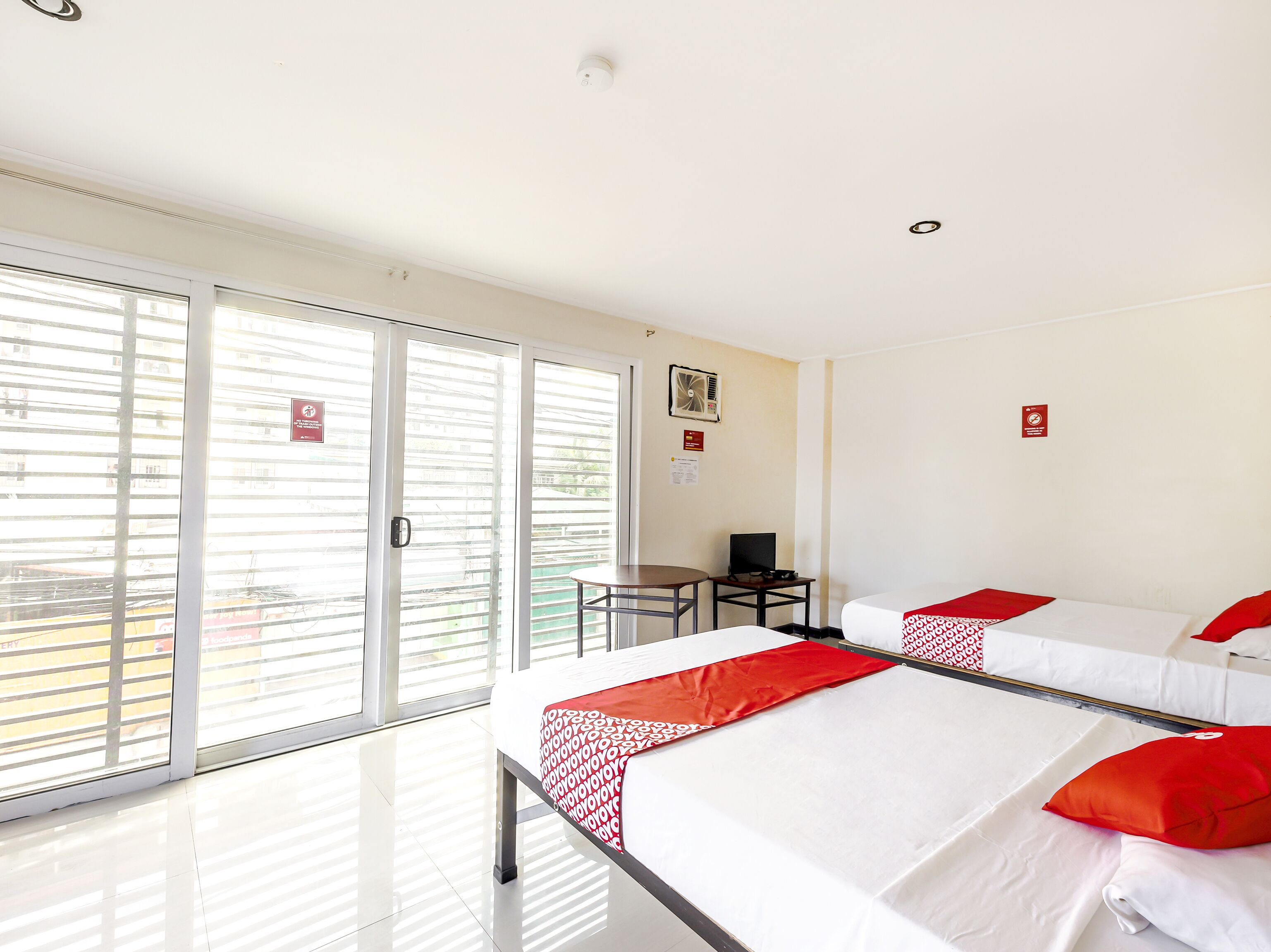 City Smiles Apartelle by OYO Rooms