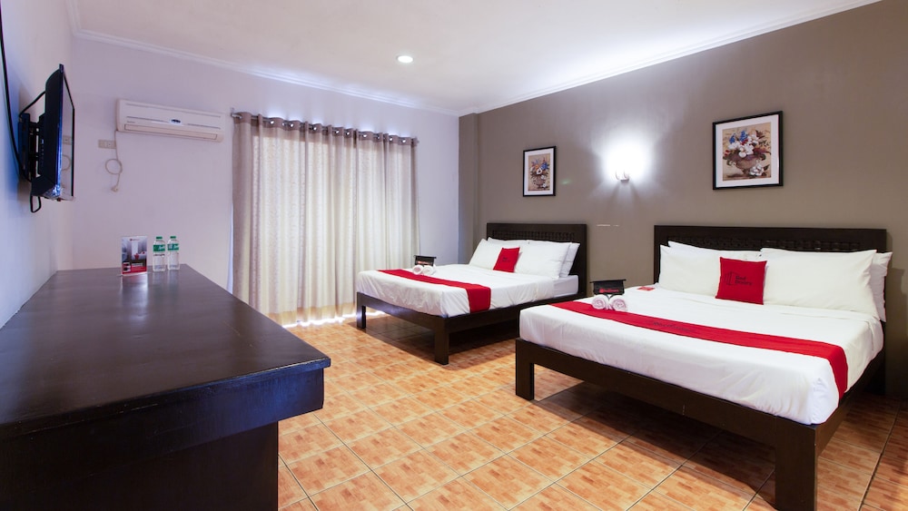 The Charm Bed and Breakfast by RedDoorz