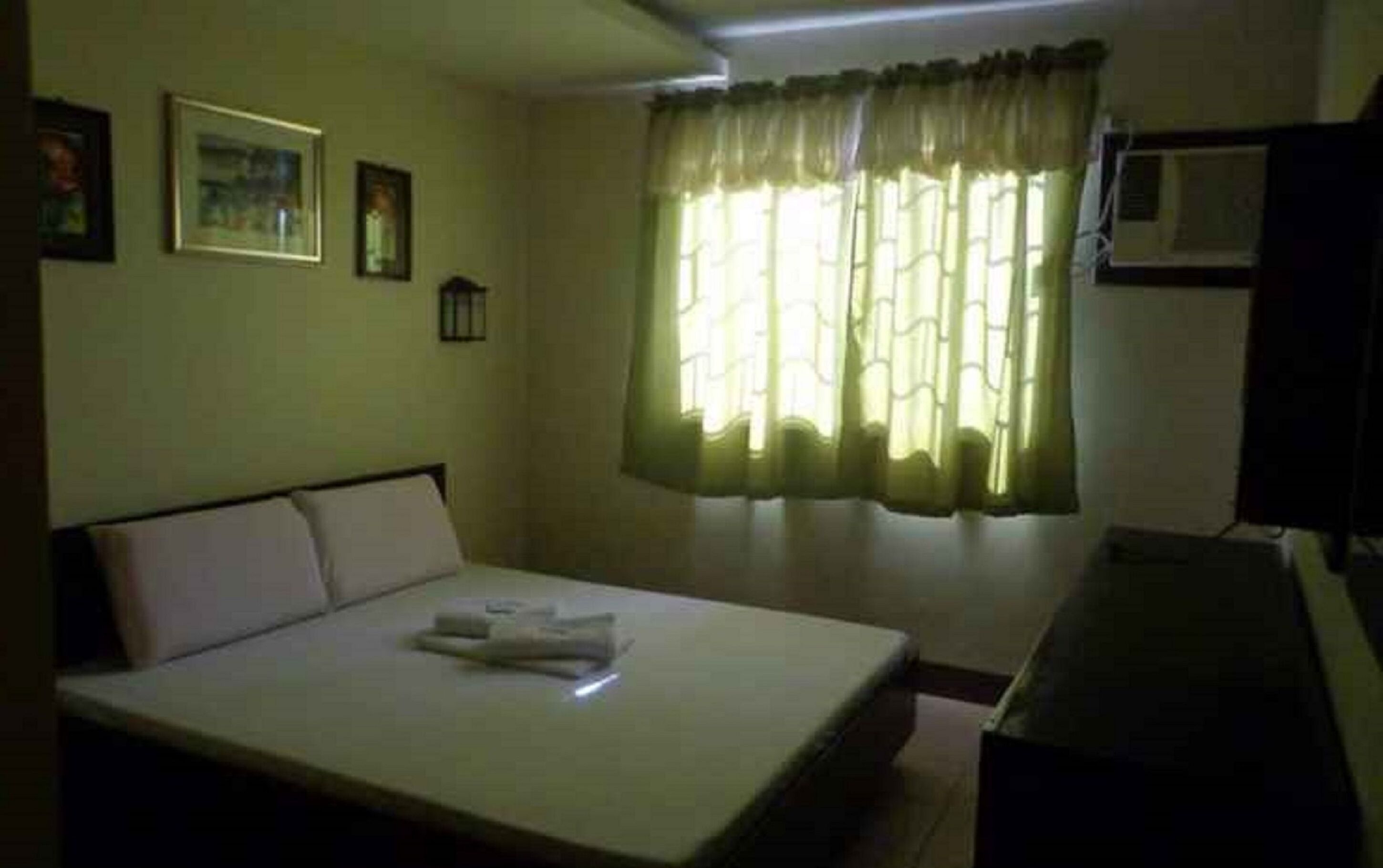 Paradise Apartelle Malinta by OYO Rooms