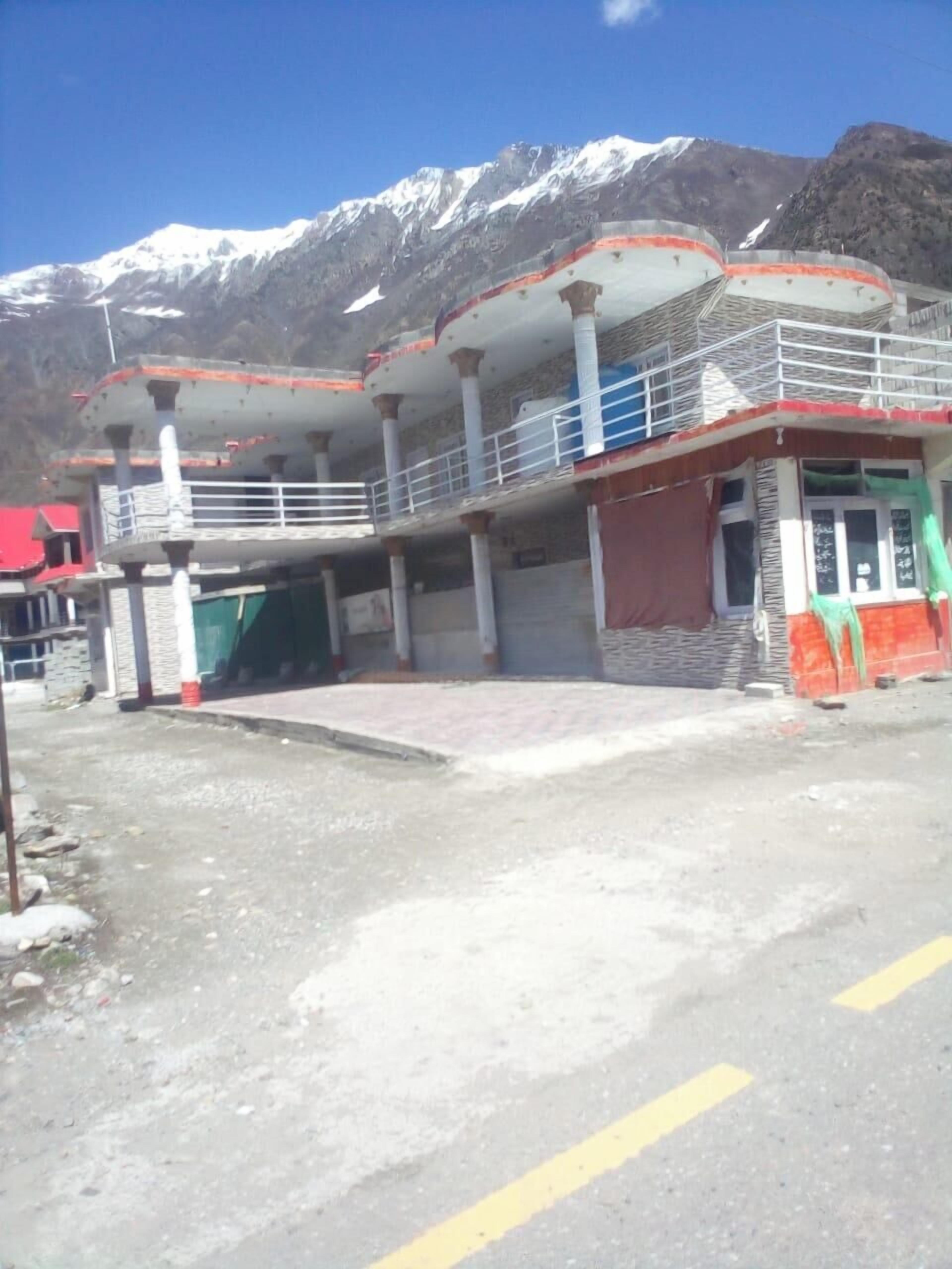 New Green Land Hotel