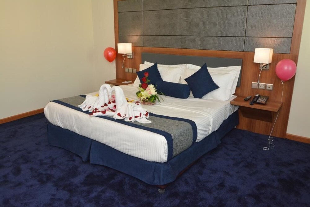 Grndeur East Hotel Suites