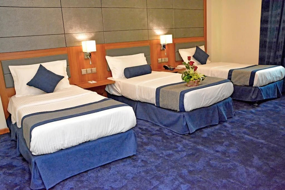 Grndeur East Hotel Suites