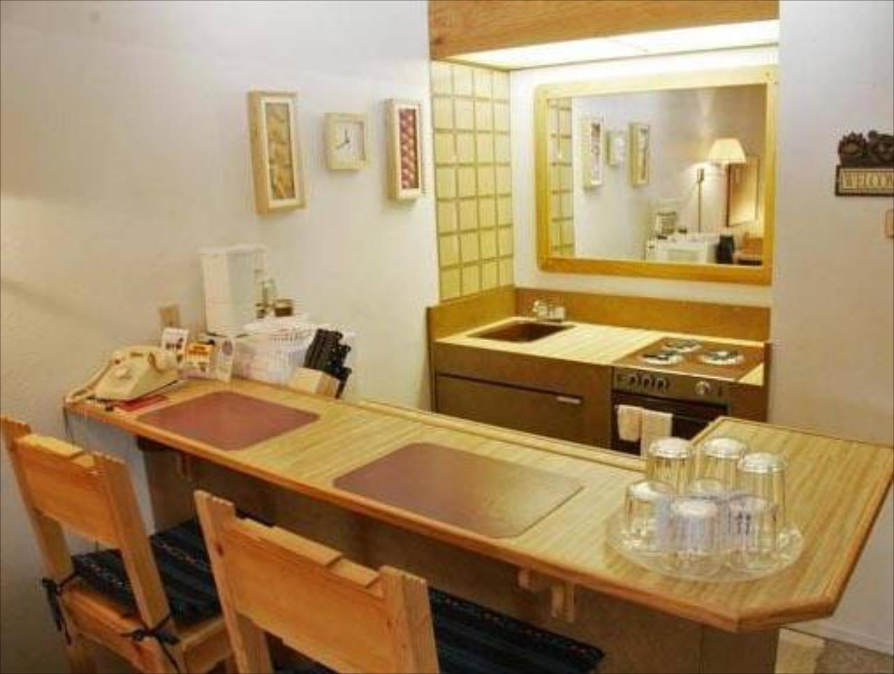 Village Lodge Suites