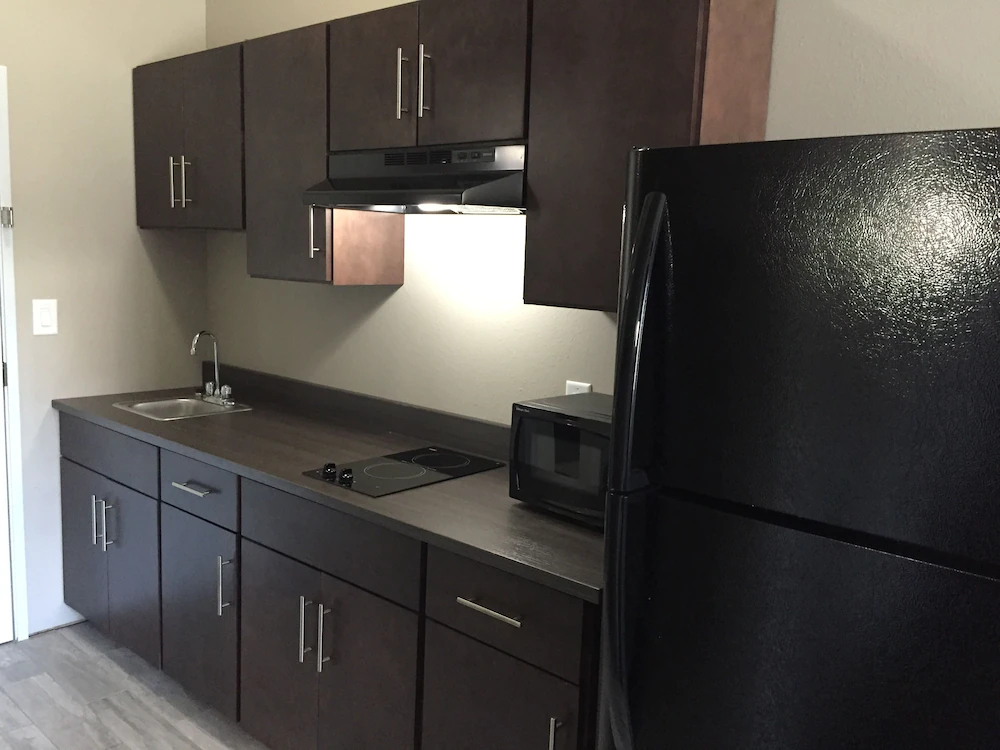 At Home Inn And Suites