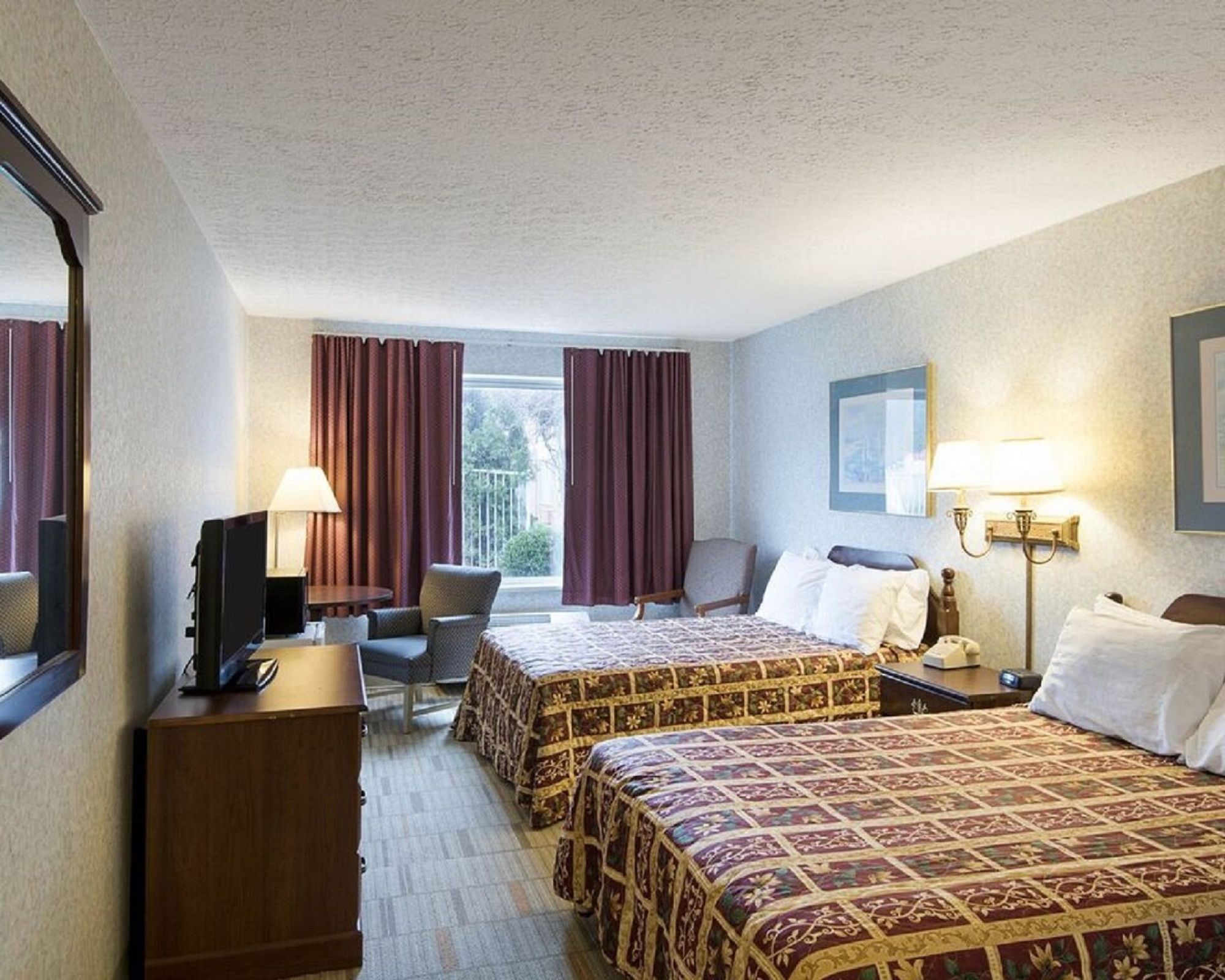 Super 6 Inn and Suites