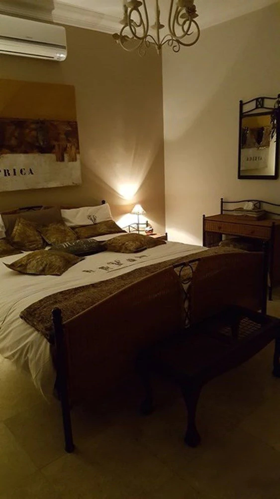 African Palm Cottage