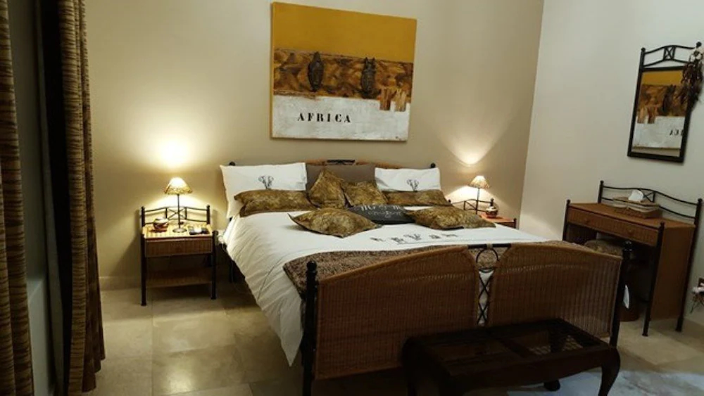 African Palm Cottage