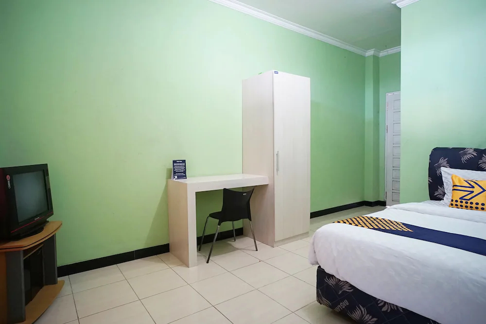 Marzan Syariah Guest House by OYO Rooms