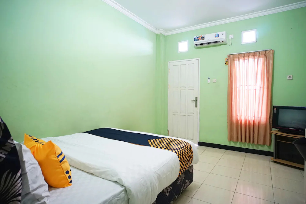 Marzan Syariah Guest House by OYO Rooms