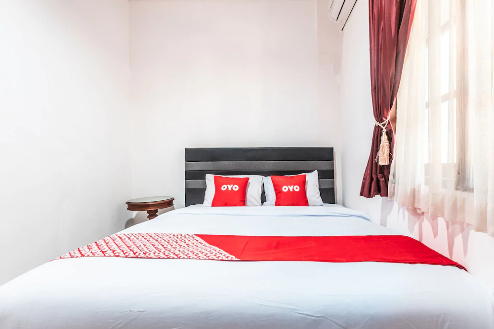 Kost Kuningan Executive Boading House by OYO Rooms