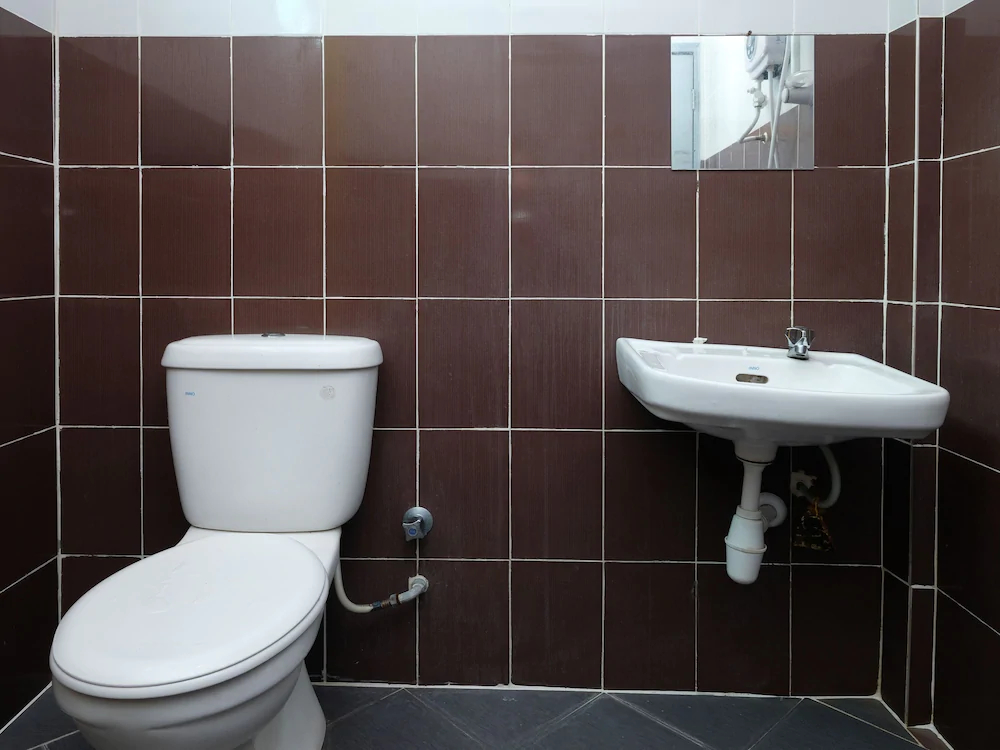 Aj Suite Hotel by OYO Rooms