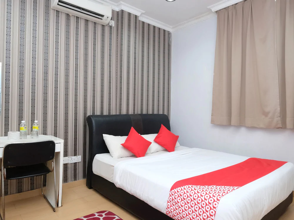 Aj Suite Hotel by OYO Rooms