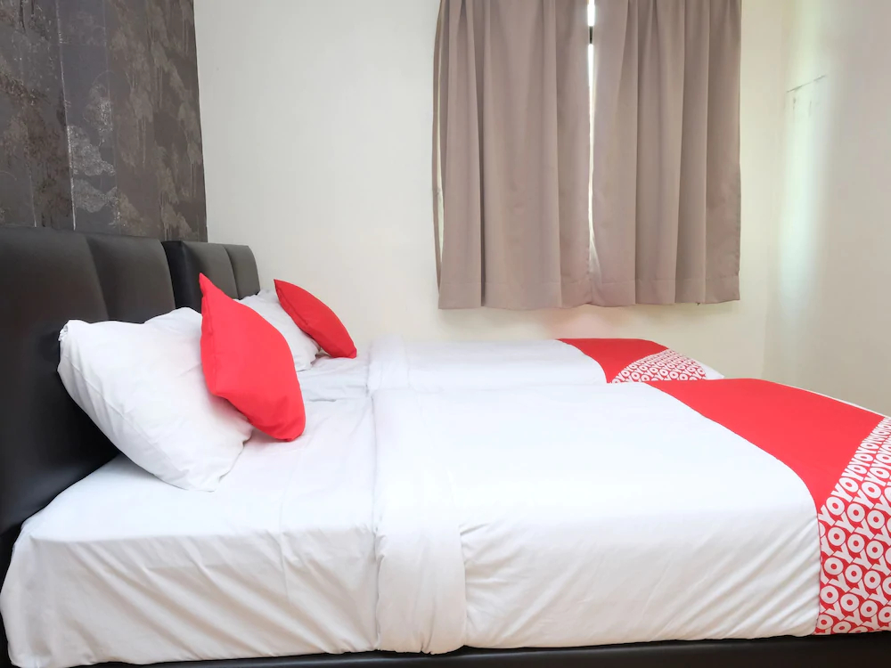 Aj Suite Hotel by OYO Rooms