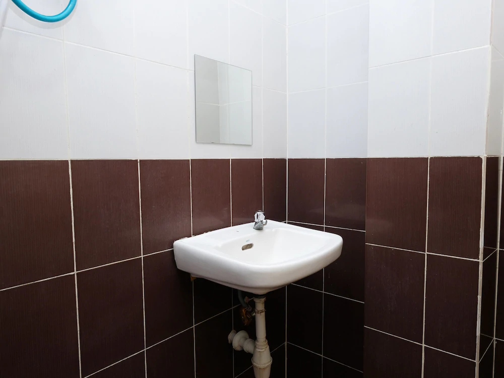 Aj Suite Hotel by OYO Rooms