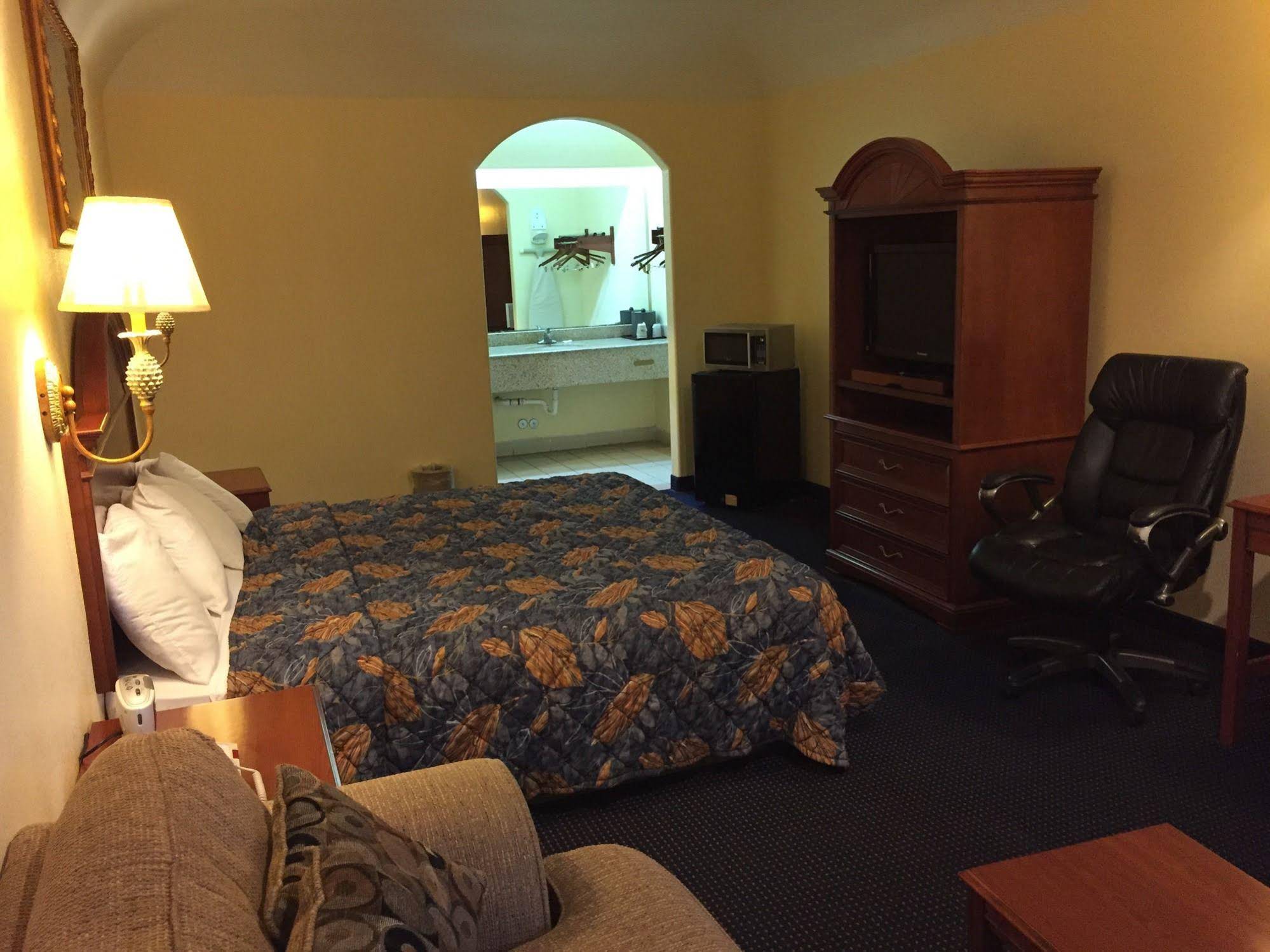 Executive Inn & Suites