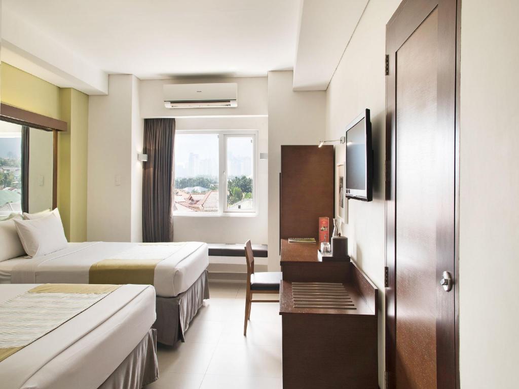 Microtel by Wyndham Acropolis Microtel by Wyndham Acropolis