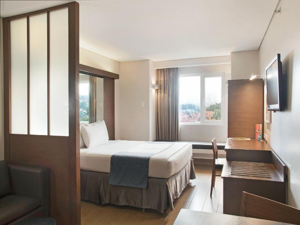 Microtel by Wyndham Acropolis Microtel by Wyndham Acropolis